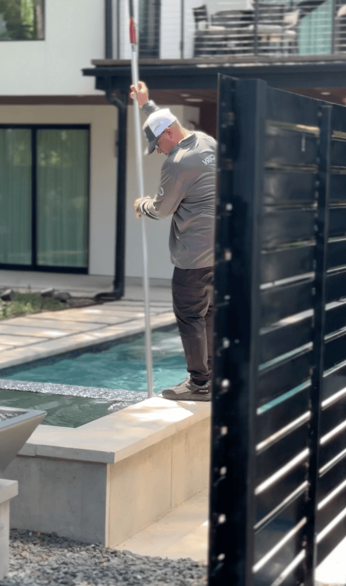 Cerv pool technician cleaning pool